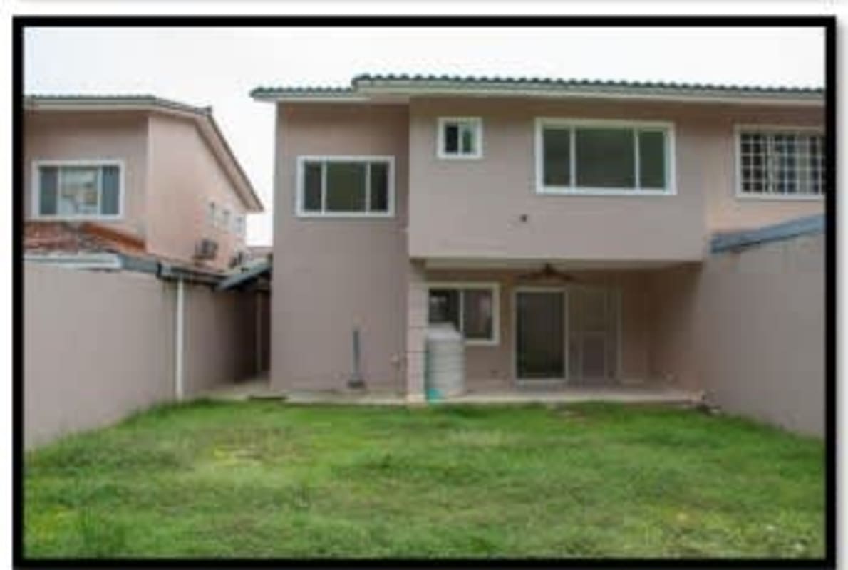 Spacious master bedroom with walk-in closet and balcony Villa Tiber Brisas del Golf Panama