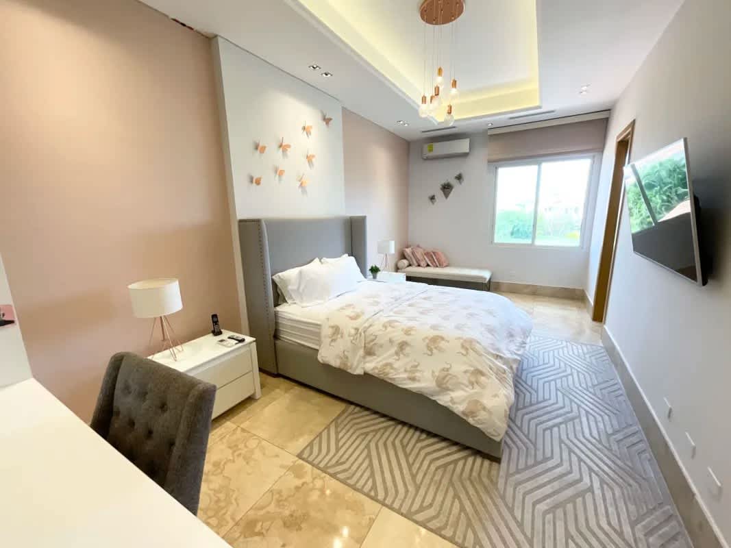 Modern bathroom with double vanity and marble finishes at Fairway Estates Santa María luxury residence