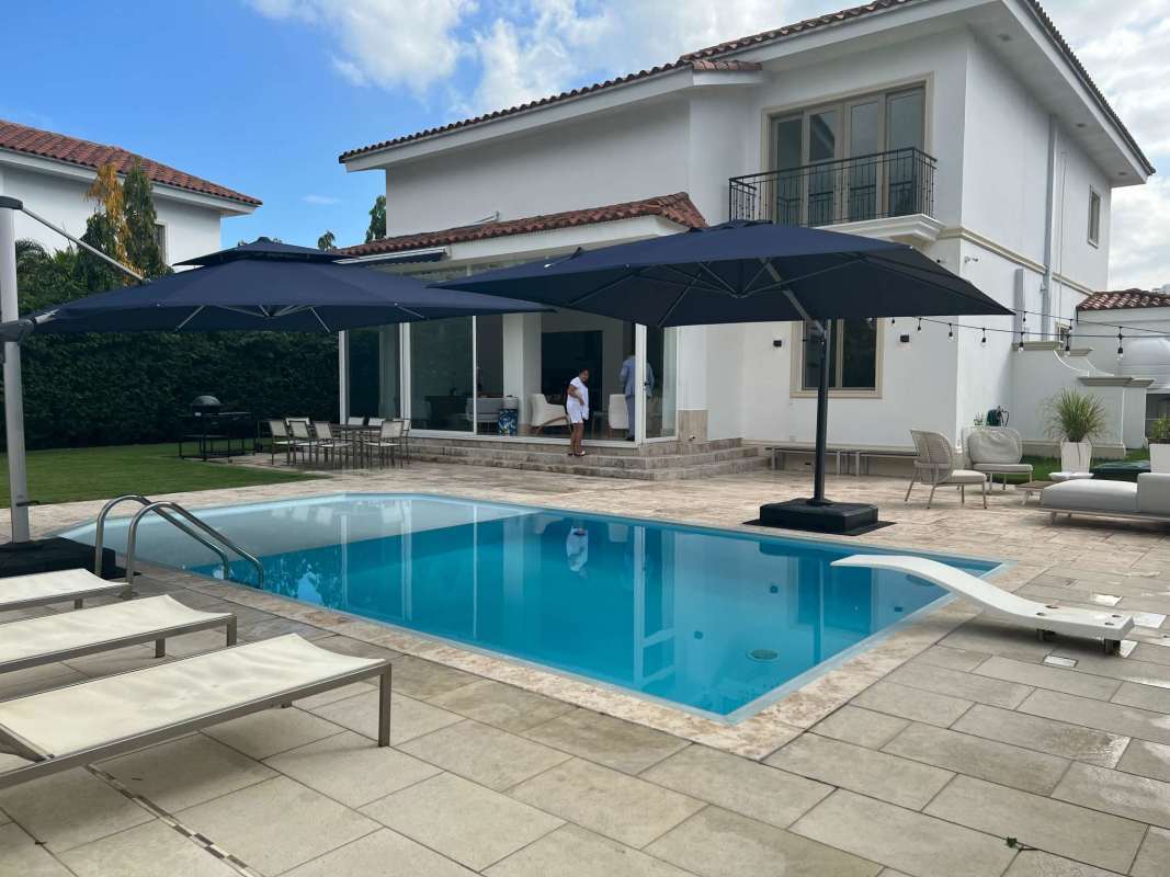 Modern fully equipped kitchen with island in luxury villa Santa Maria Golf Panama