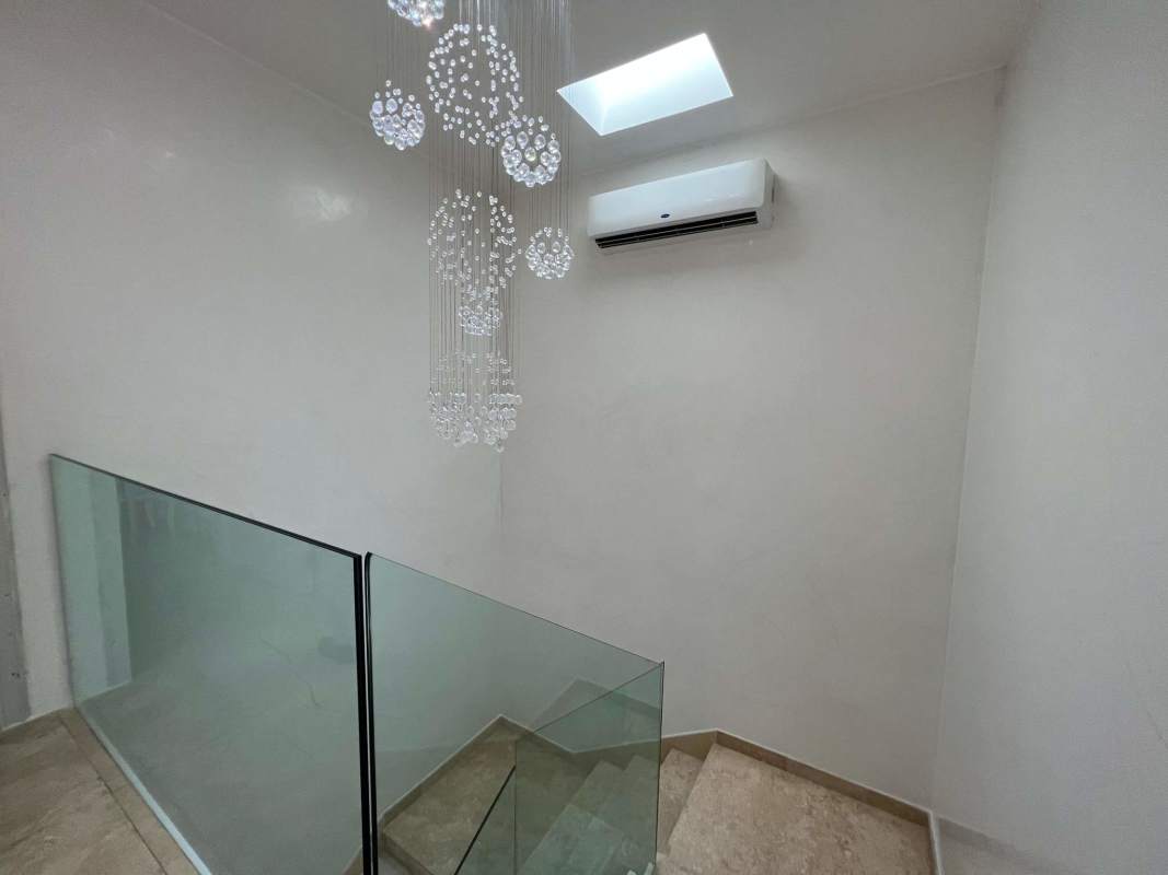 Master suite marble floors garden view luxury villa Santa Maria Golf Panama