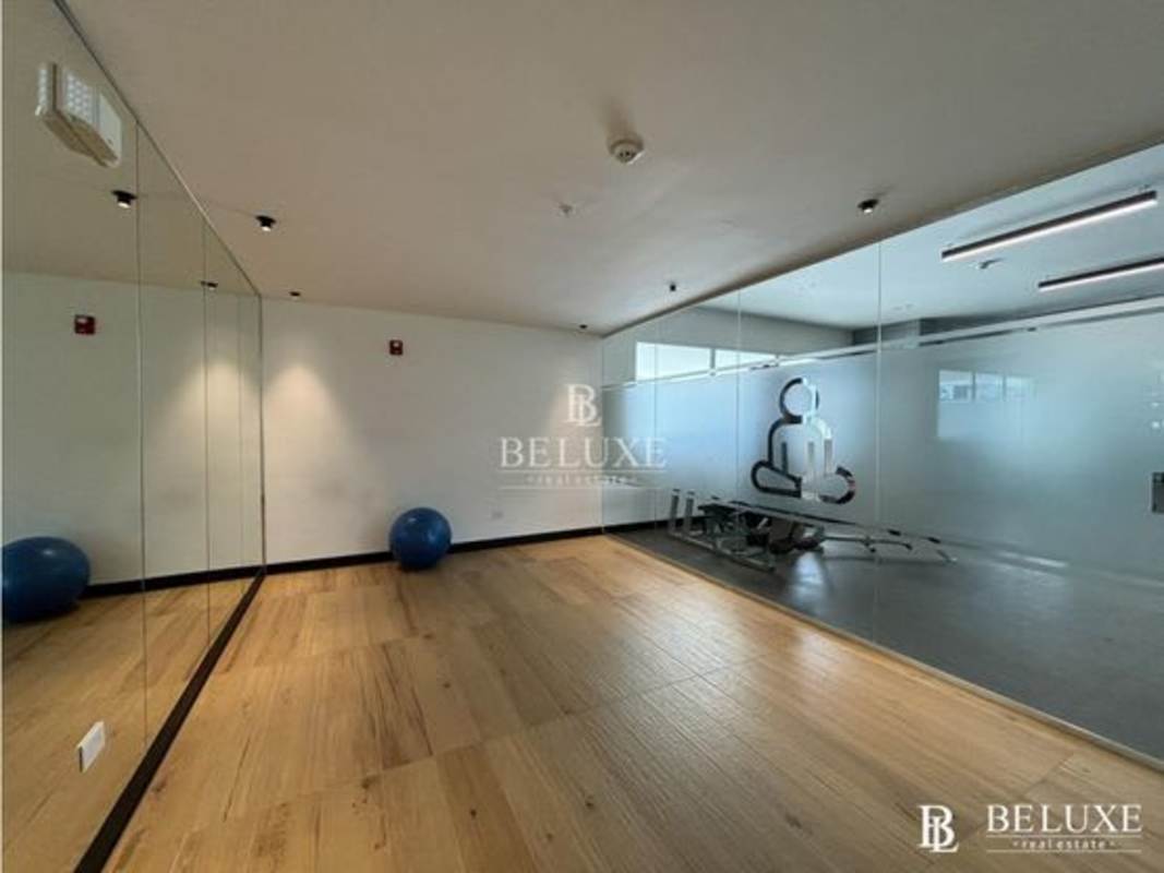 Infinity pool area with lounge at PH Van Gogh El Cangrejo Panama City