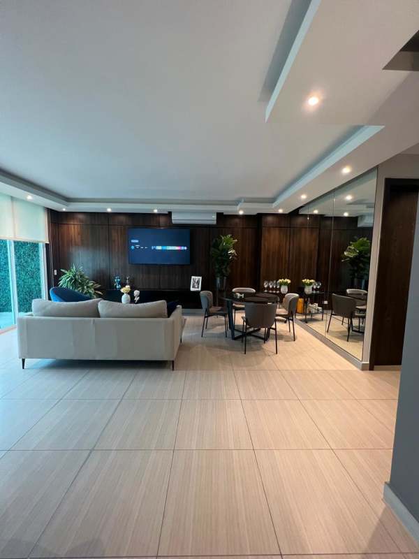 Spacious living room with floor-to-ceiling windows and balcony PH Asia Costa del Este Panama