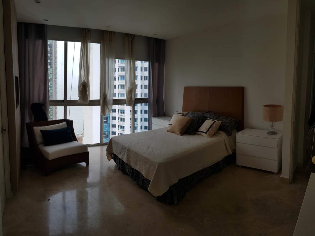 Spacious kitchen with island, gas cooking, marble floors in PH Aqualina luxury apartment Punta Pacifica Panama City