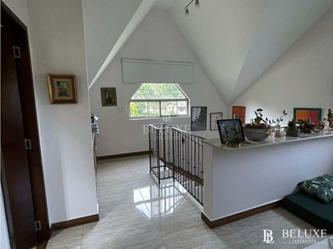 Bright loft area with high ceilings, modern decor, Embassy Gardens Clayton Panama