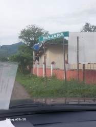 Road adjacent lot with mature trees and green landscape in Lidice Capira Panama