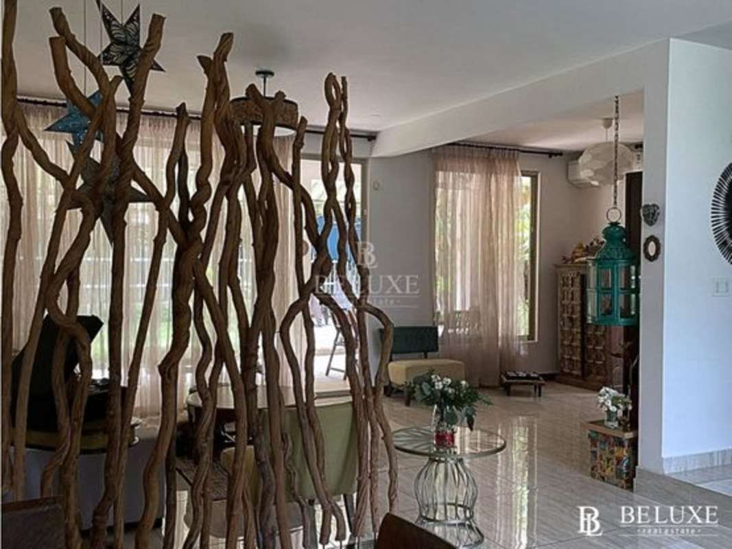 Fully equipped modern kitchen with wooden cabinets and granite at PH Embassy Gardens Clayton Panama