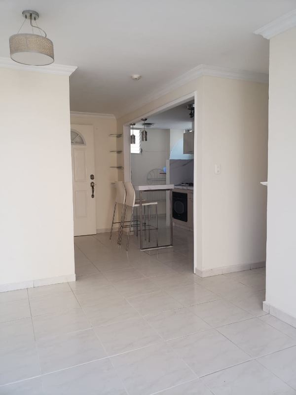 Kitchen with breakfast bar, pendant lighting, refrigerator in PH MC Greggor Condado del Rey Panama