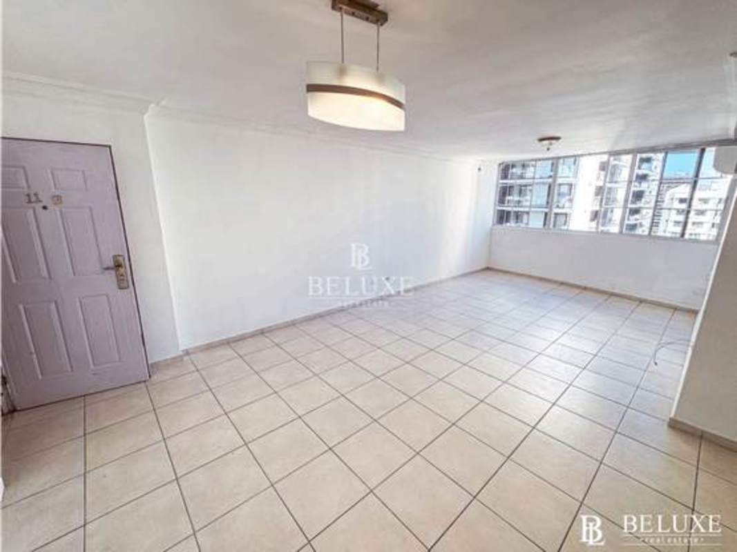 Spacious living room with balcony access in PH Mar del Sur San Francisco Panama