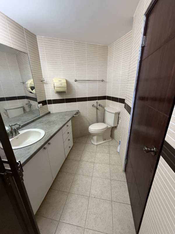 Bathroom with walk-in tiled shower glass door granite vanity in PH Cancun Obarrio Panama