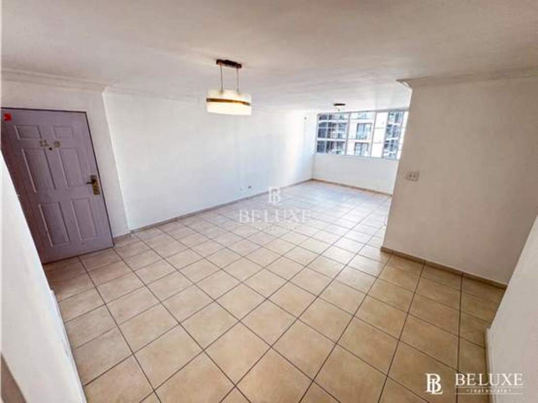 Spacious living area with bright light and city views in PH Torres Mar del Sur Panama City