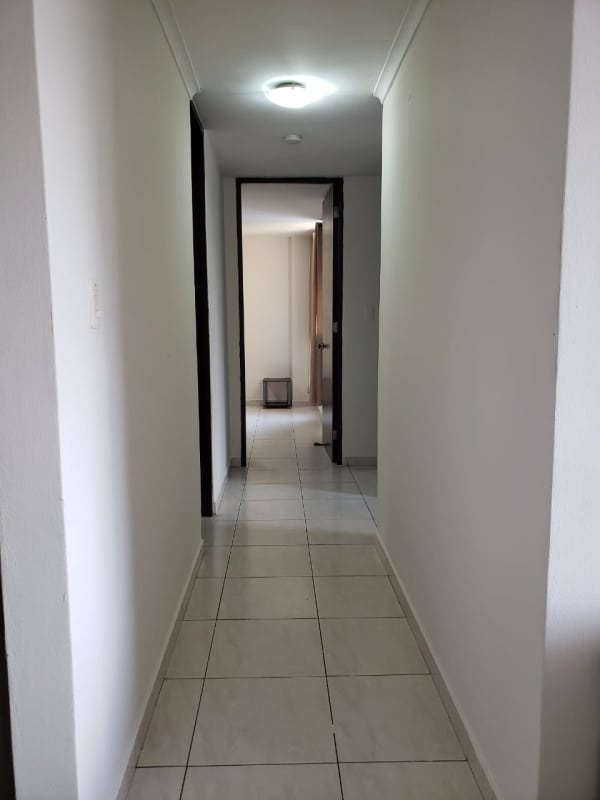 Hallway with ceramic tile flooring at PH McGregor Valley Condado del Rey Panama apartment