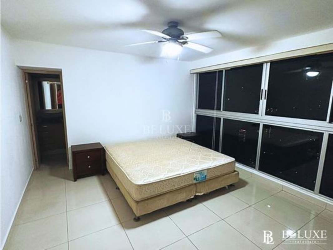 Private balcony with glass railing city and ocean view PH Moon Tower Panama