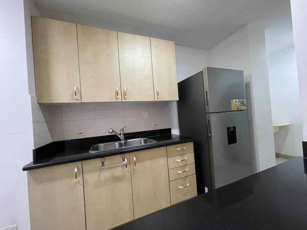 Spacious bedroom with tiled floor, large window, roller blinds and AC in PH Sevilla Towers Costa del Este Panama