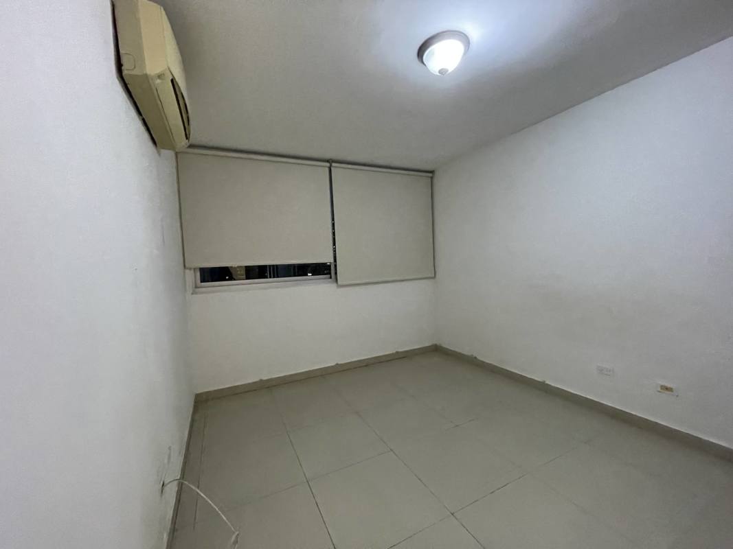 Spacious walk-in closet with drawers and hanging rods in Costa del Este Panama apartment