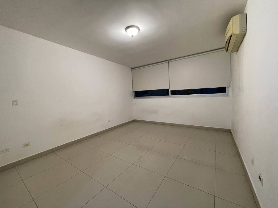 Contemporary bathroom with double sink vanity and glass-enclosed shower in PH Sevilla Towers Costa del Este Panama