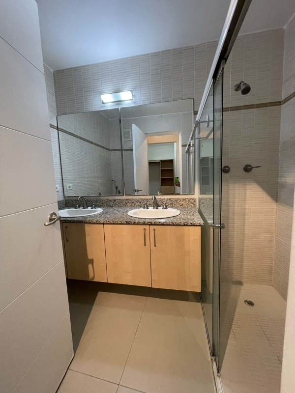 Night panorama of Panama City's skyline from PH Sevilla Towers balcony