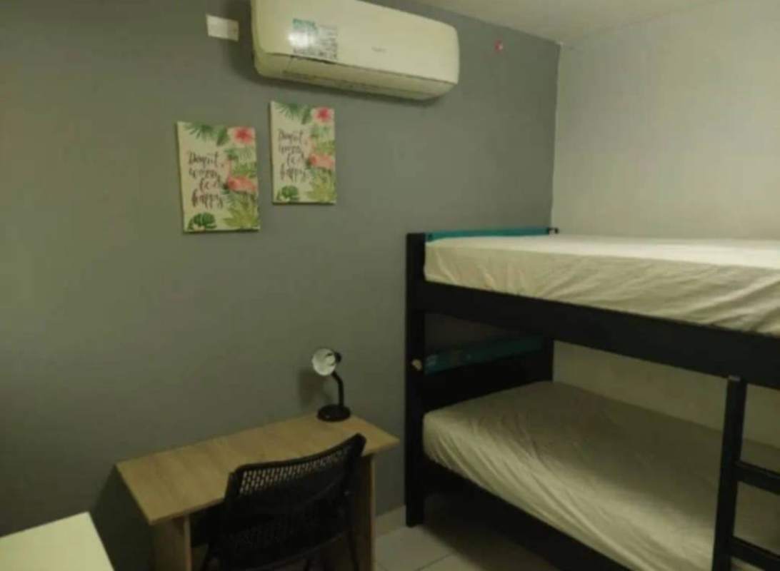 Utility room with stacked washer dryer, large fridge in PH Metropolitan Park Panama