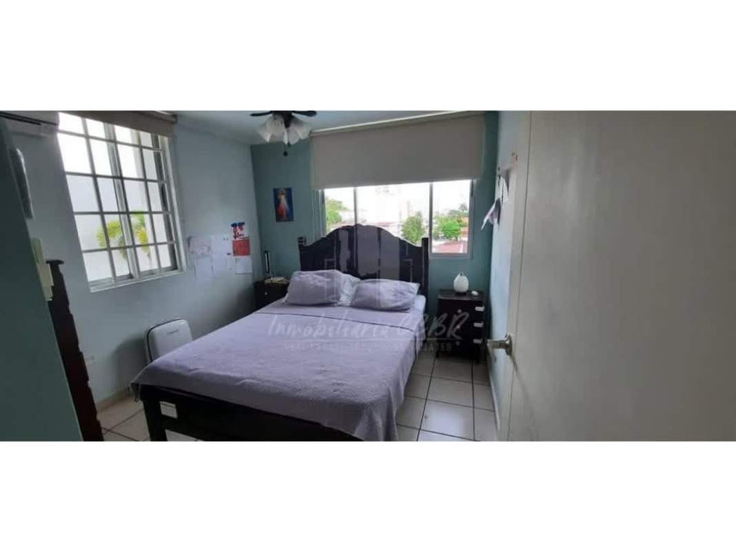 Bedroom with tiled floor and large window PH Plaza Valencia Carrasquilla San Francisco Panama