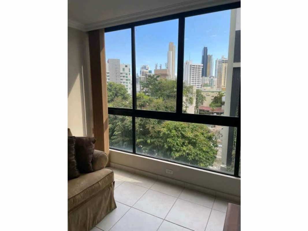 Bathroom with glass shower, white tiles, and sink vanity in PH Las Garzas El Cangrejo Panama