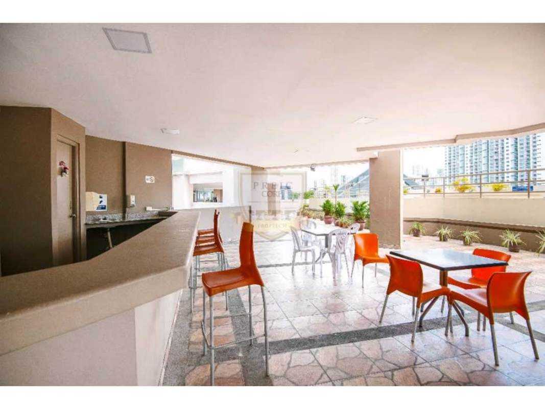 Community event space with folding chairs and tables in PH Brisas de San Fernando Panama City