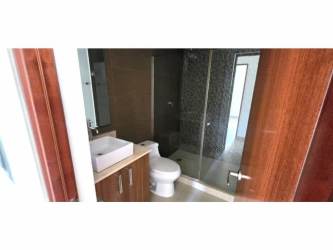 Bright master bedroom with walk-in closet in River Valley Panama Pacifico apartment for sale