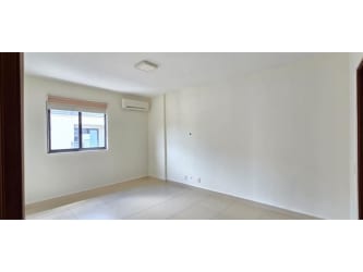 Bathroom featuring glass enclosed shower and granite vanity in Panama Pacifico