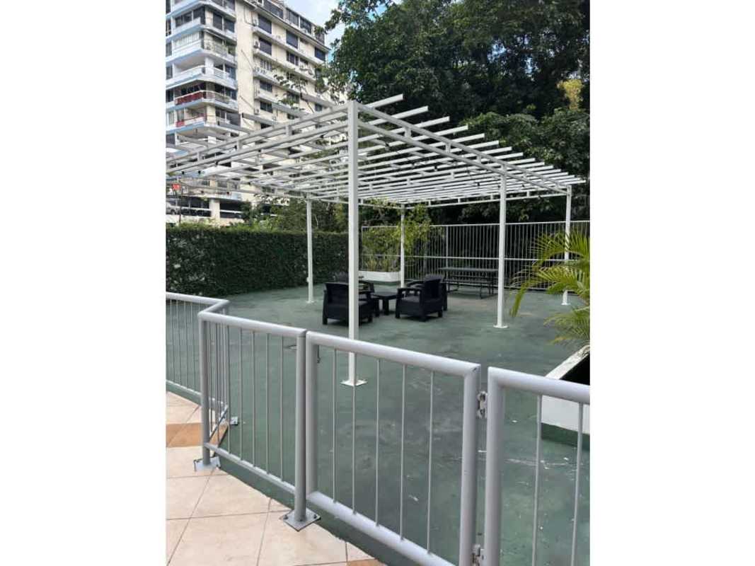 Bathroom with walk-in shower, window and tile PH Bella Vista Tower Panama