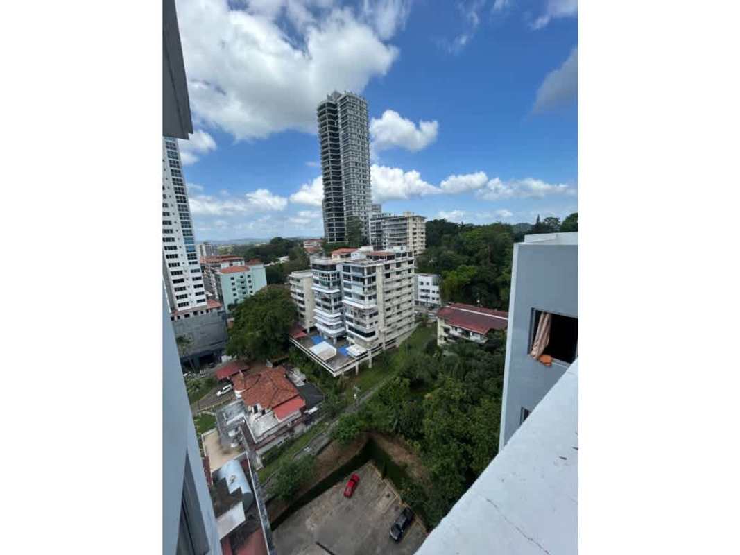 Apartment bedroom with split AC unit, large window and closet at PH Bella Vista Tower Panama
