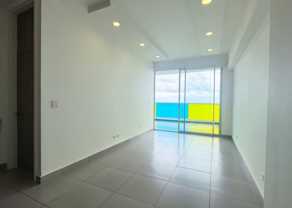 Modern living room with sliding glass doors balcony ocean view PH Element Panama City