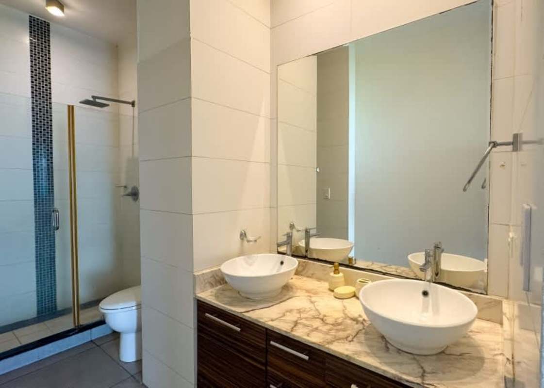 Glass shower enclosure bidet accent tile minimalist design PH Element Tower Panama City