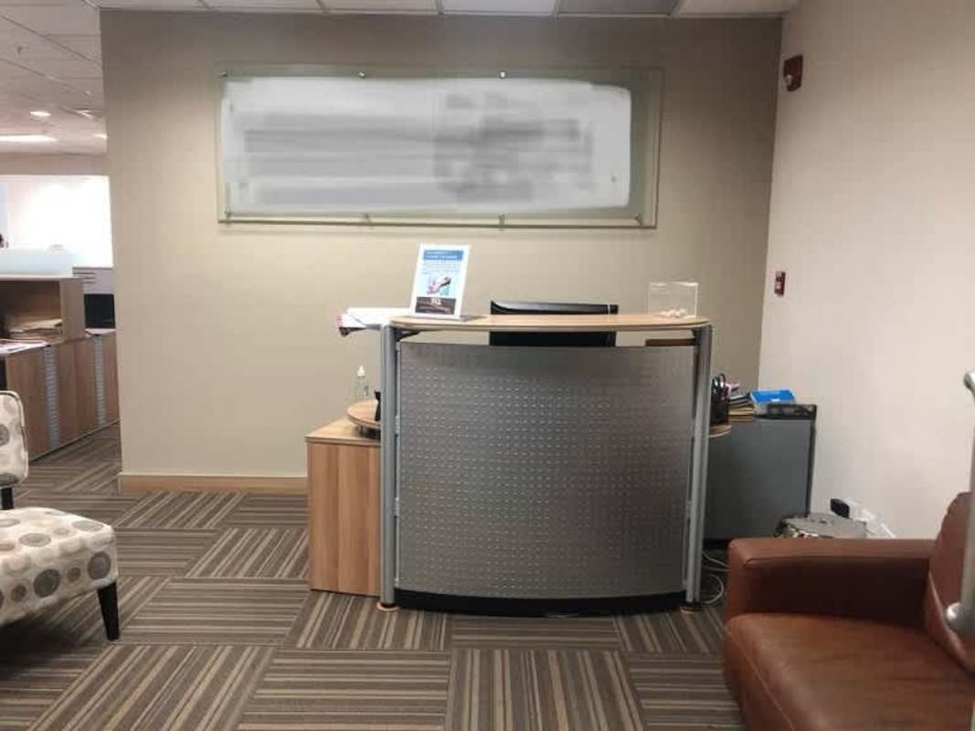 Private office with desk, city view window, and modern decor in Obarrio Center Panama