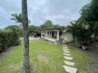 Aerial of residential beach neighborhood with greenery near Pacific Coast Nueva Gorgona Panama