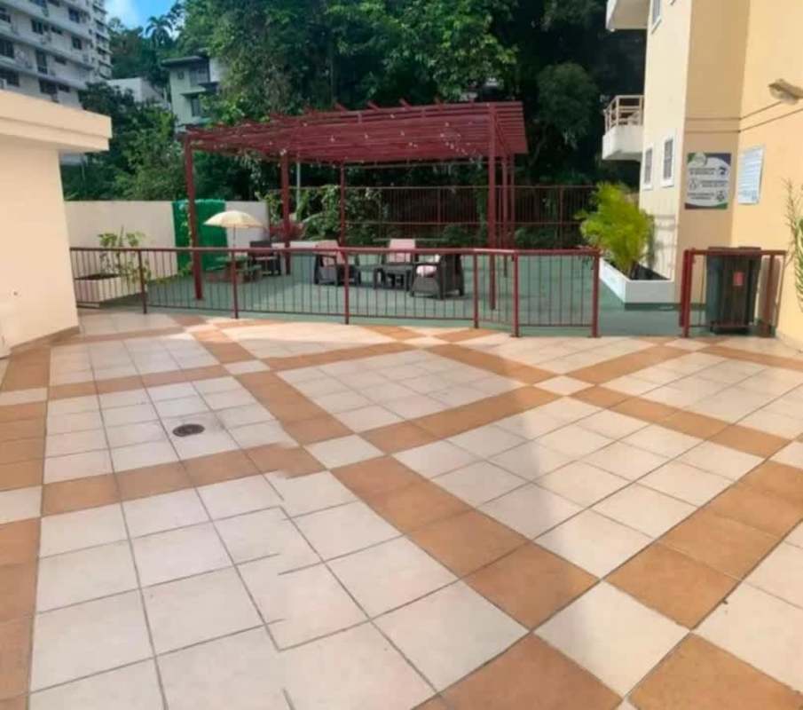 Compact bathroom with walk-in shower, toilet and pedestal sink PH Bella Vista Panama City