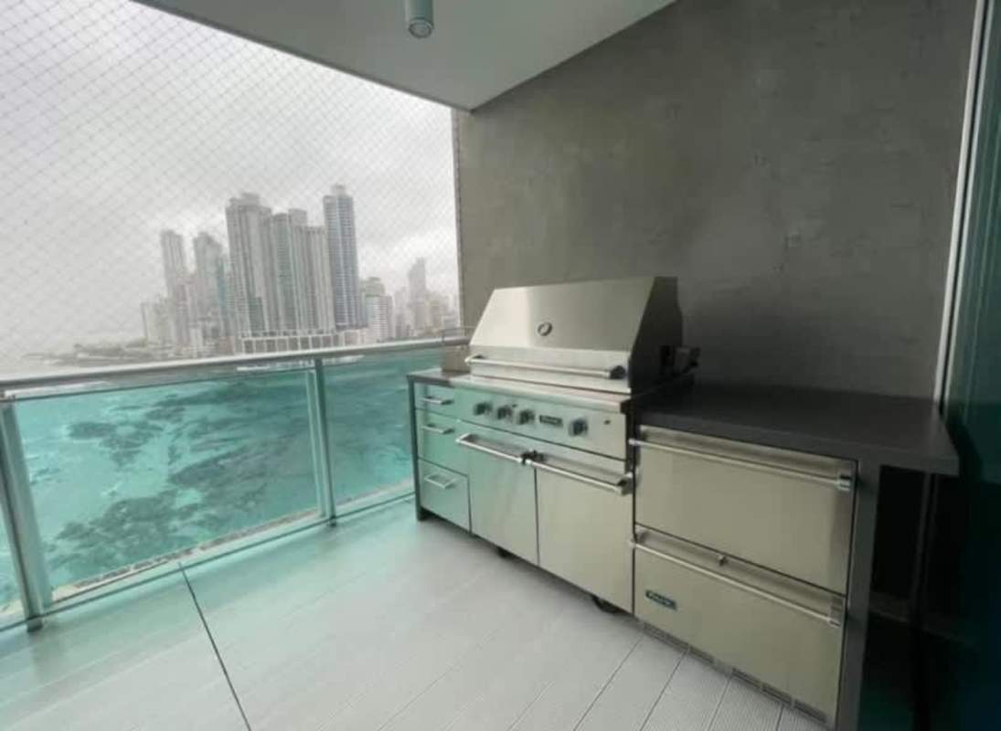 Balcony with stainless steel BBQ grill stunning ocean skyline views at PH Ocean Club Punta Pacifica