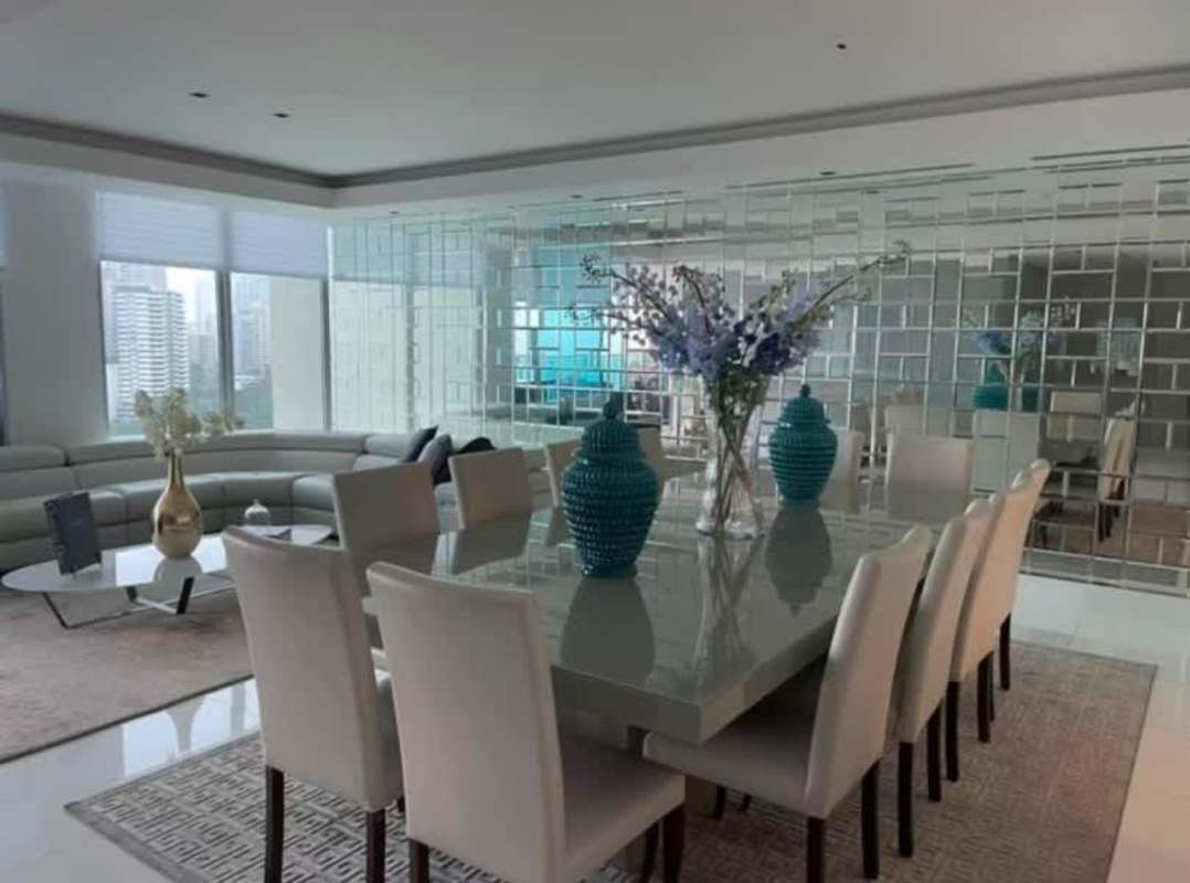 Minimalist master bedroom with work desk, gym area in Ocean Club Punta Pacifica Panama