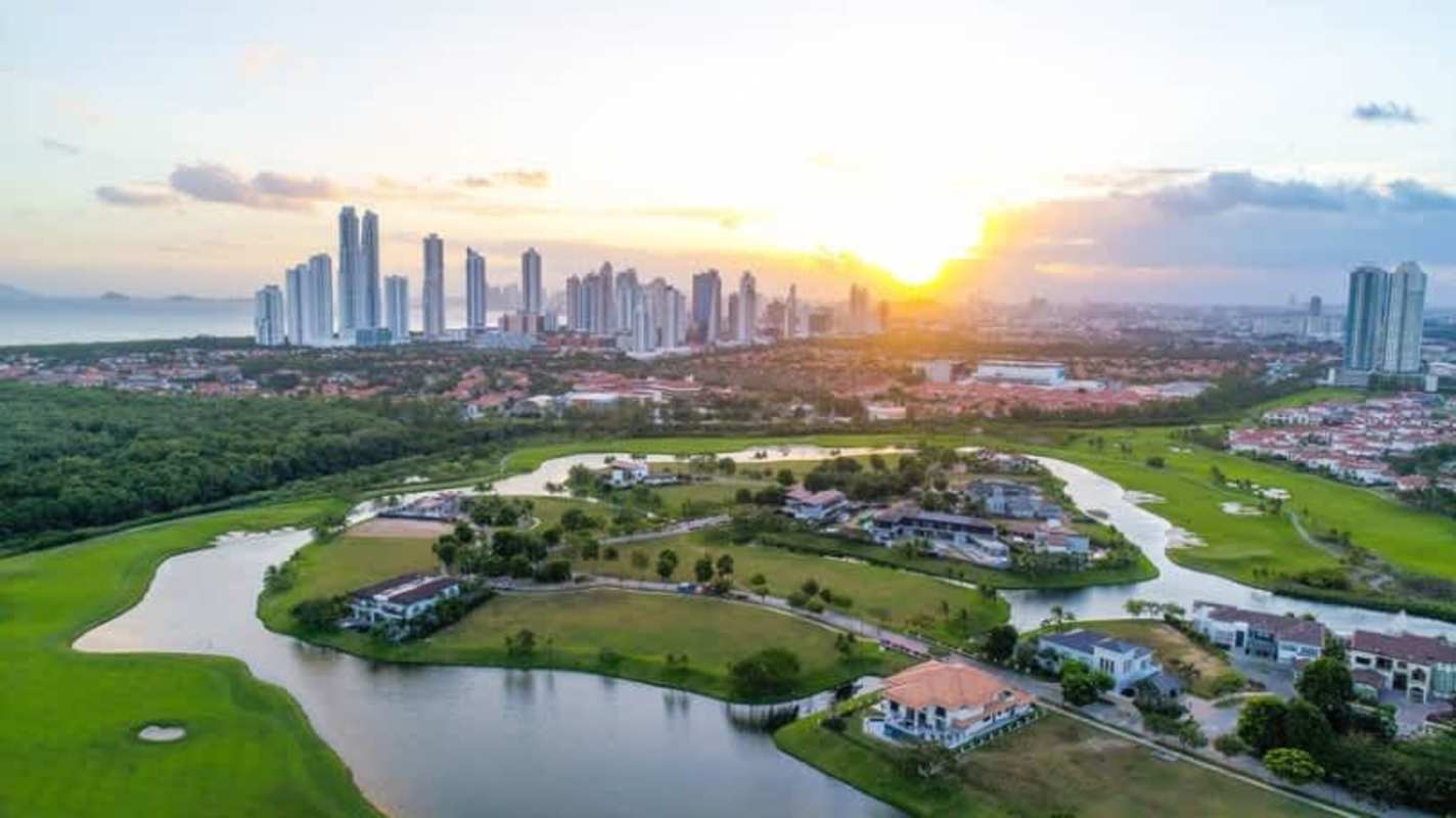 Aerial view of Santa María with golf course, water features, residential towers near Panama City