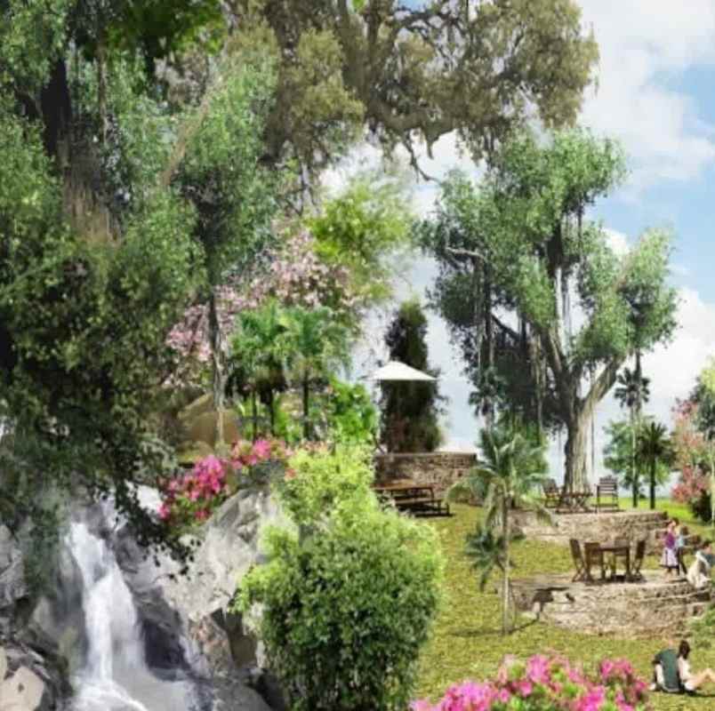 Beautifully landscaped eco park with waterfall, lake, lush trees in Jardines de Albrook Panama