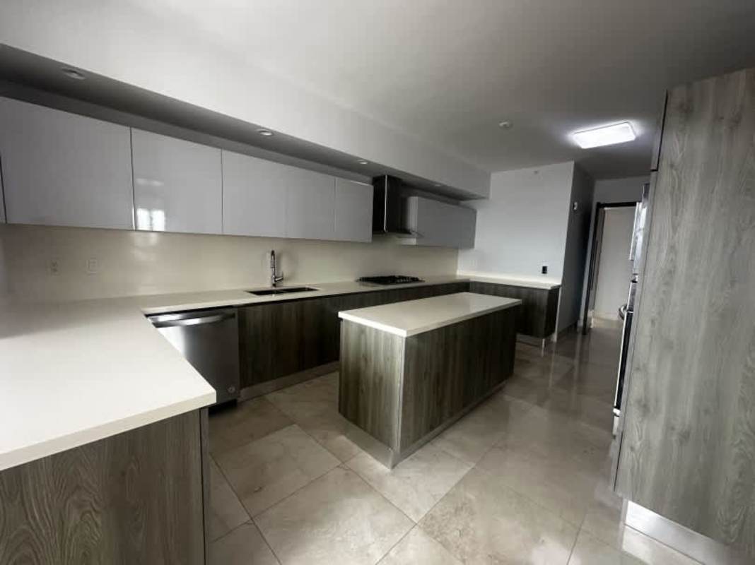 Elegant modern bathroom with glass shower and double sink at Santa Maria Panama
