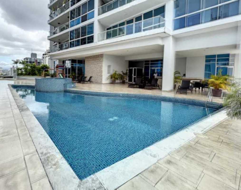 Outdoor swimming pool with jacuzzi and lounge chairs El Cangrejo Panama