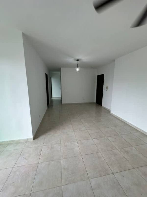 Modern dark wood kitchen cabinets granite countertops built-in oven in PH Park City Obarrio Panama