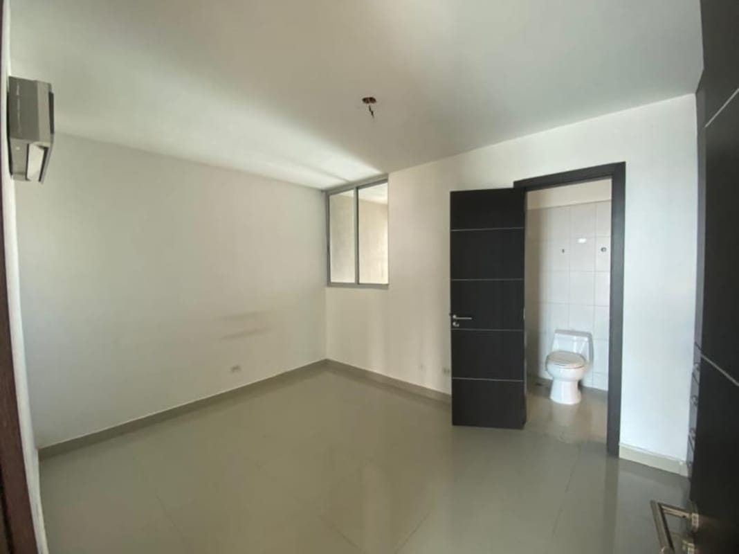 Bright bedroom with large window and ocean views at PH Titanium San Francisco