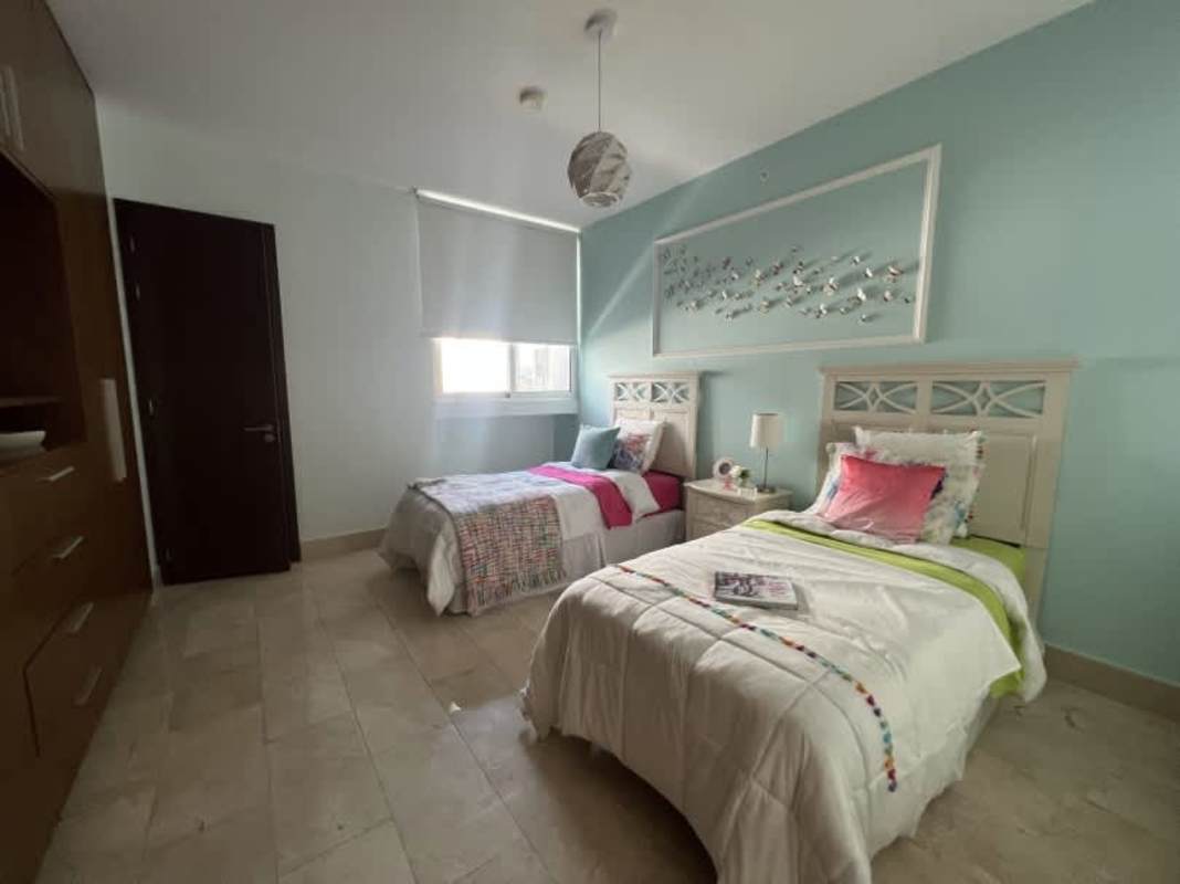 Spacious modern living room with large windows and ocean views at PH Panorama Panama City