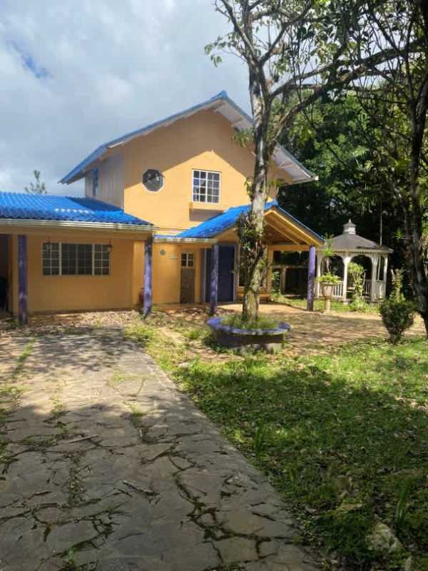 Curved bay window dining area in mountain home with panoramic nature views in Cerro Azul Panama