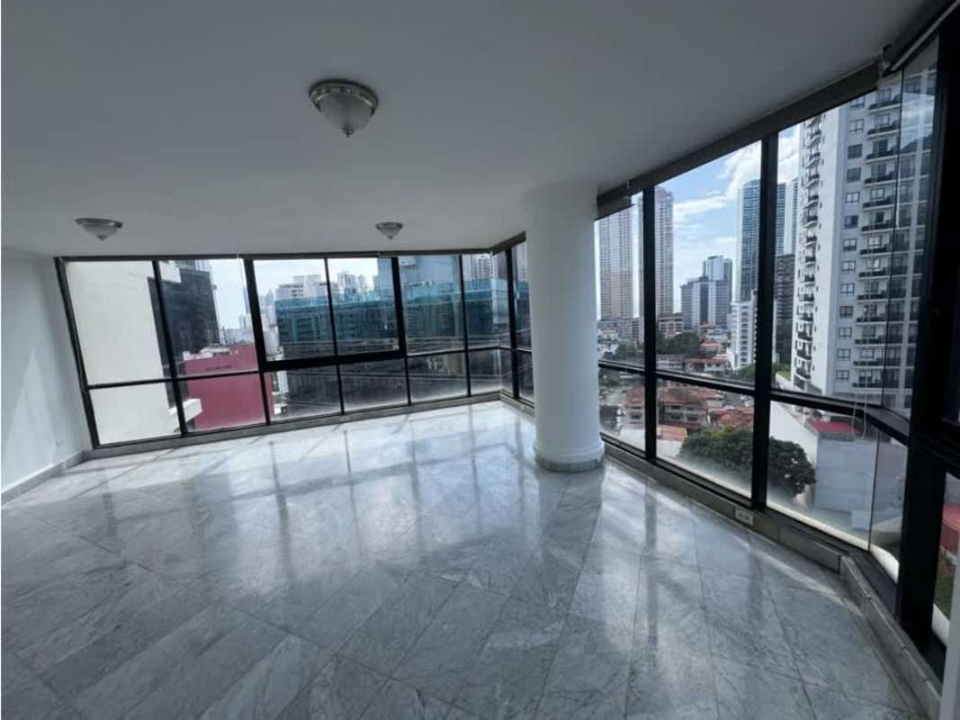 Laundry room with double sink, window city view, tiled walls at PH Vista Tower Panama City