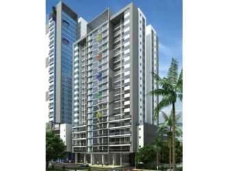 High-rise modern condo tower PH Miró with balconies and palm trees in vibrant El Cangrejo Panama City