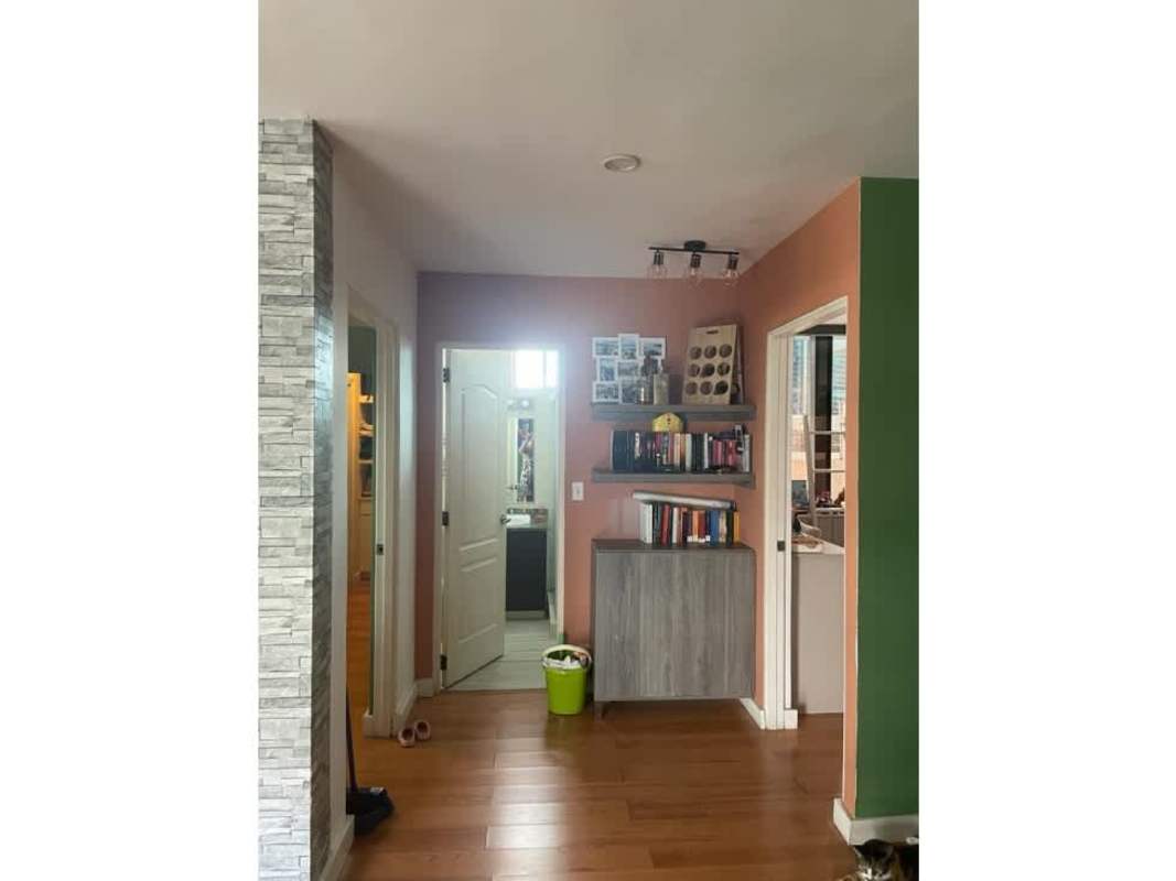 Modern hallway with book shelves, wood floors in PH Cangrejo 507 El Cangrejo Panama