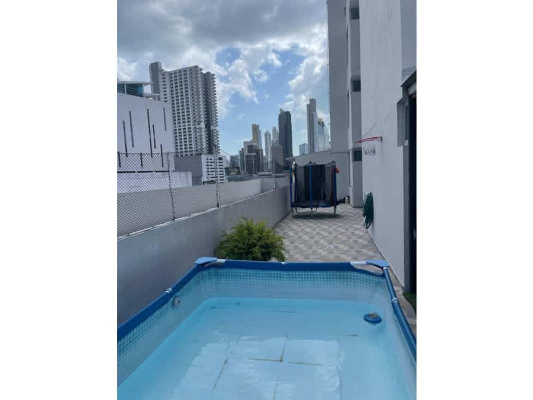 Rooftop terrace featuring portable pool, trampoline, skyline at PH Cangrejo 507 Panama