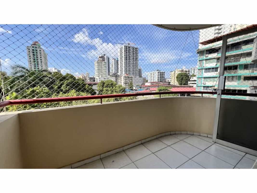 Black cabinetry kitchen with granite counters and tile backsplash PH Del Caribe El Cangrejo Panama City