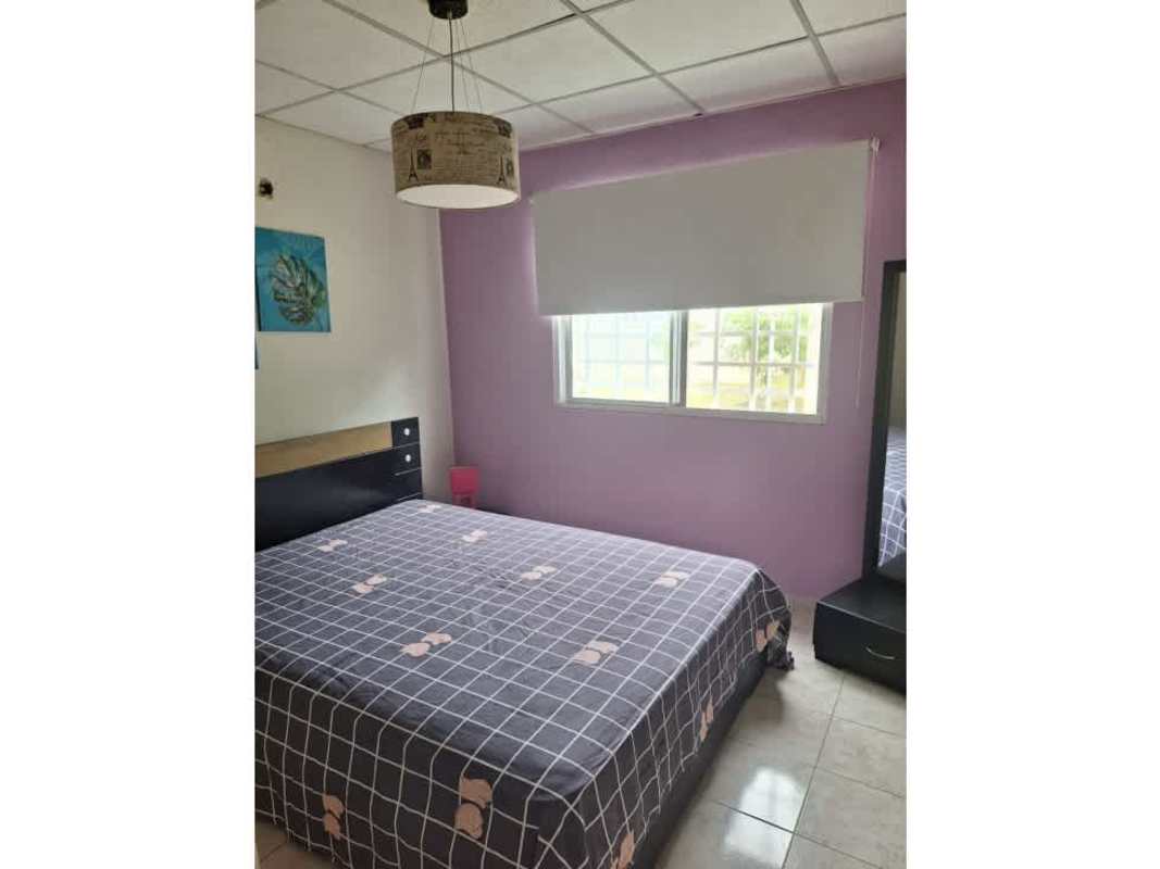 Modern bathroom with shower curtain, vanity sink and tile in Tocumen Panama