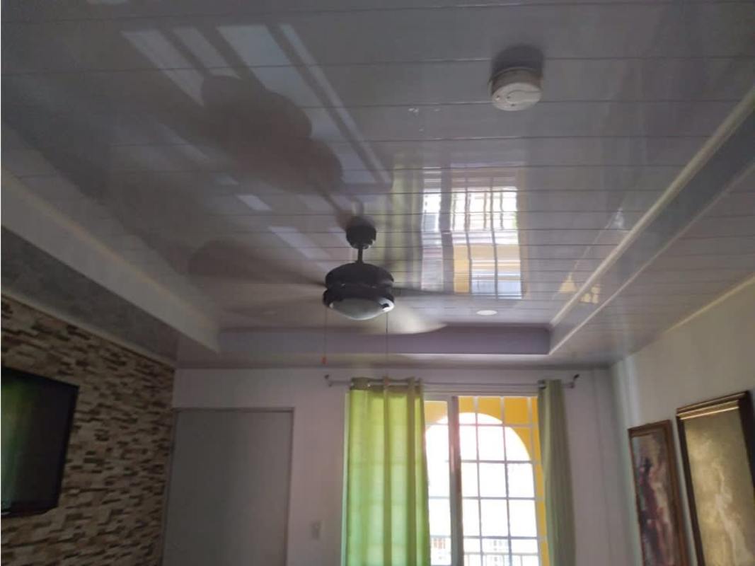 Bright living dining area with fan and balcony at PH Cantabria V Tower 400 Las Acacias Panama